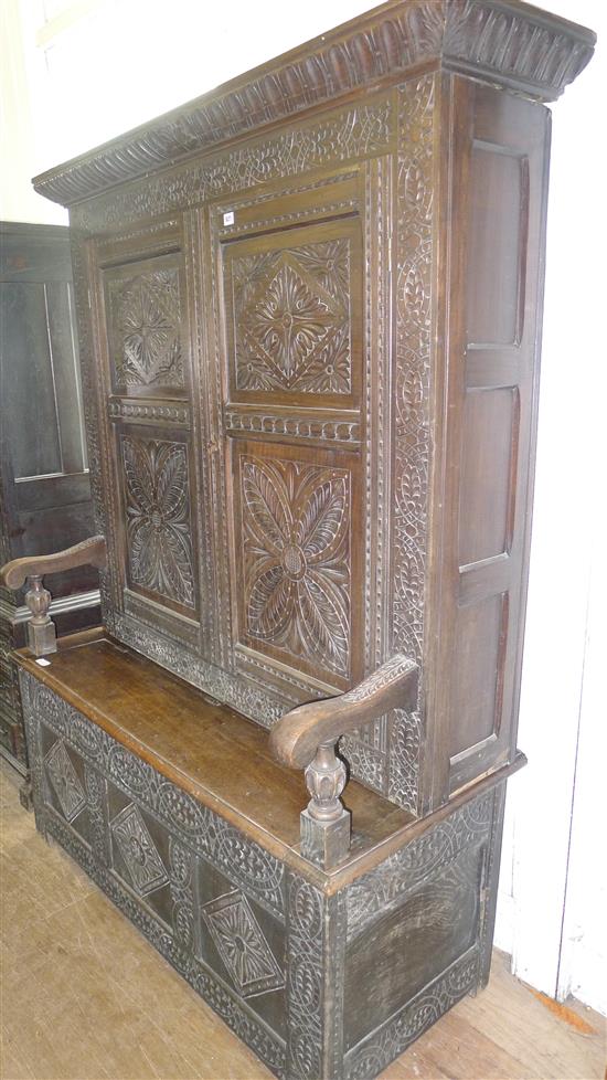 Carved oak hall cupboard/monks bench